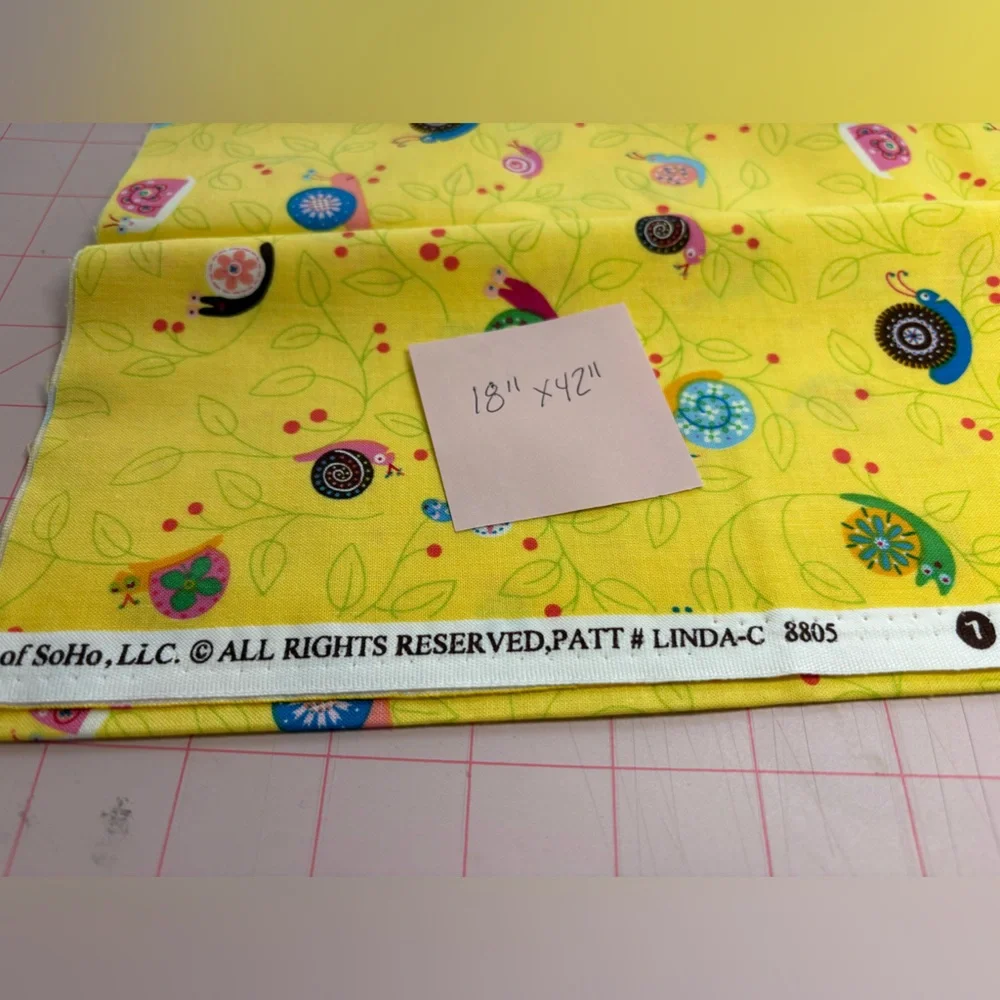 Snail Trails colorful print on yellow background. 1/2 yard cut cotton.